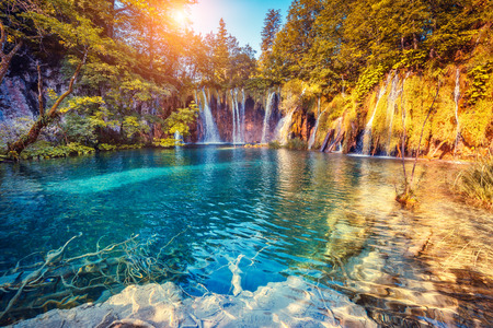 44978813 - majestic view on turquoise water and sunny beams in the plitvice lakes national park, croatia